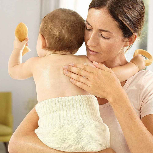 Massaggio neonatale: benefici e tecniche contro coliche e stitichezza del neonato - Babykid